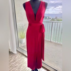 Long Burgundy halter dress with front slit & wrap around belt.